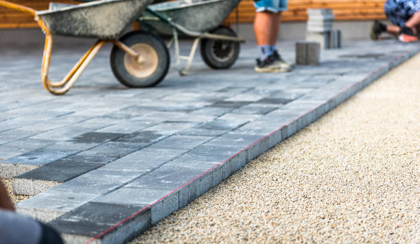 Best Concrete Sidewalk Installation  in Owosso, MI